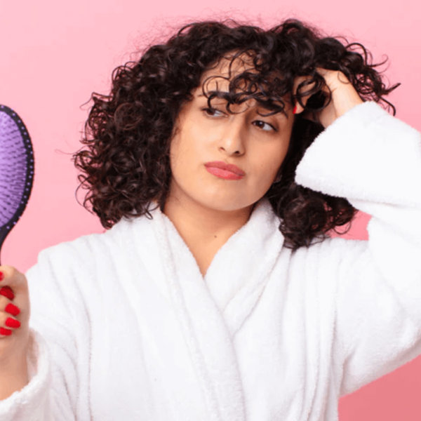 How To Brush Curly Hair Without Causing Frizz